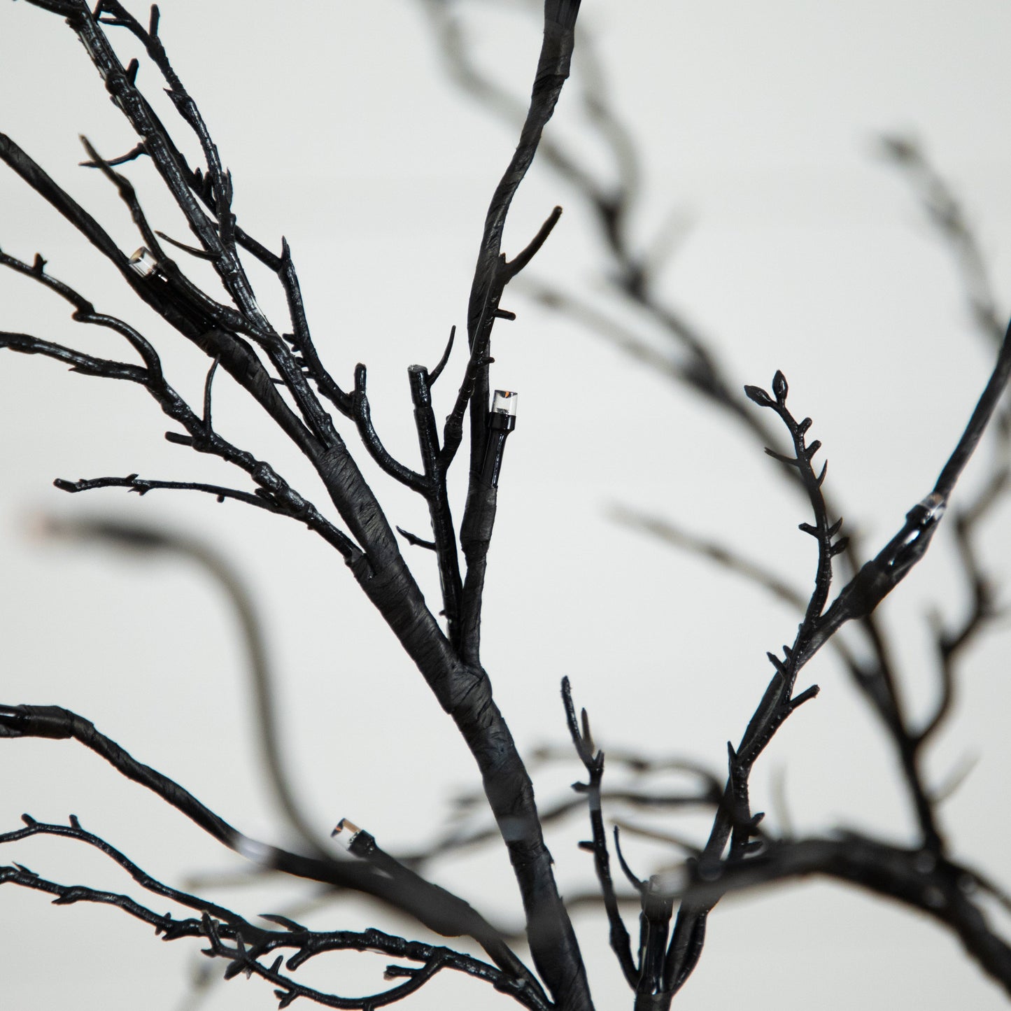 5’ Pre-Lit Halloween Deluxe Black Twig Artificial Tree with 102 Orange & Purple LED Lights