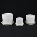 3-Piece White Stoneware Planter Set with Geometric Line Design pot with plastic saucer