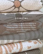 Ghosting Around Geometry Tea Towel