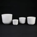 4-Piece White Plastic Round Planter Pot Set – Minimalist Modern Design