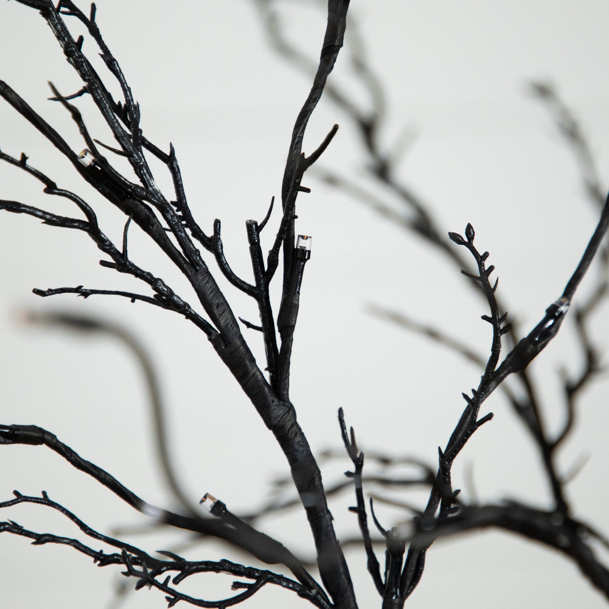 5’ Pre-Lit Halloween Deluxe Black Twig Artificial Tree with 102 Orange & Purple LED Lights