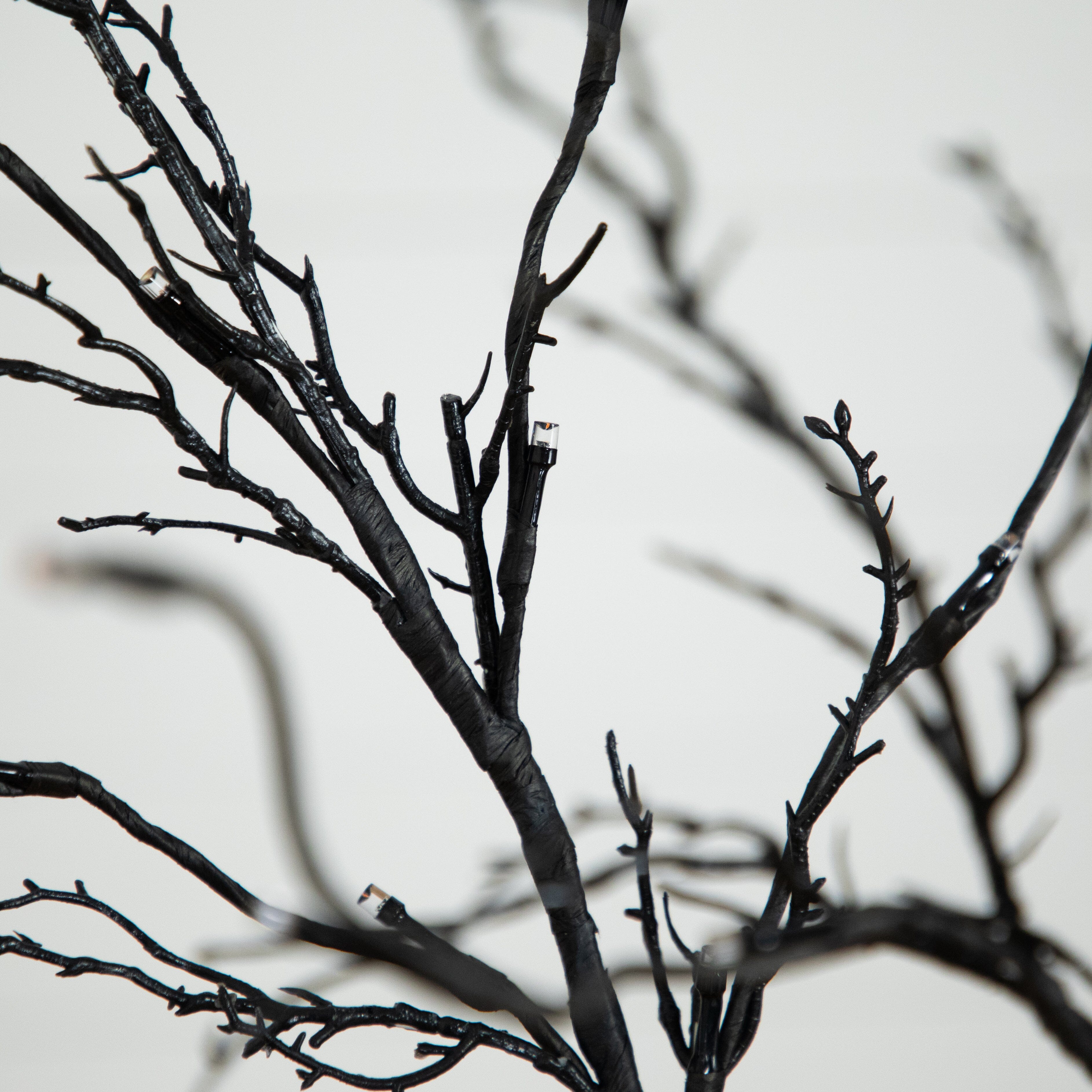 5’ Pre-Lit Halloween Deluxe Black Twig Artificial Tree with 102 Orange & Purple LED Lights